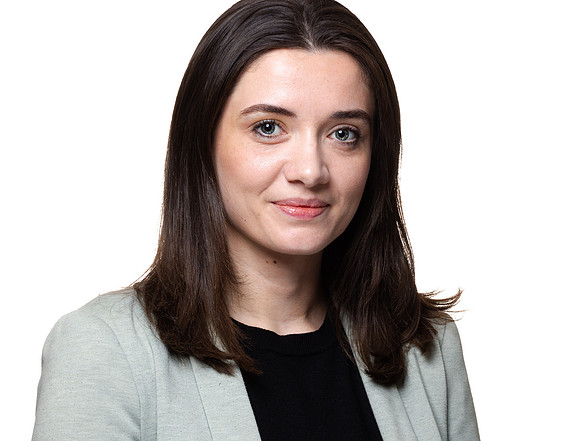Headshot against white background of businesswoman